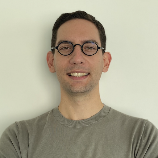 Portrait of Efe Akdemir, Operational Excellence Manager at wamo, smiling against a plain light background
